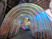 A giant rainbow balloon arch
